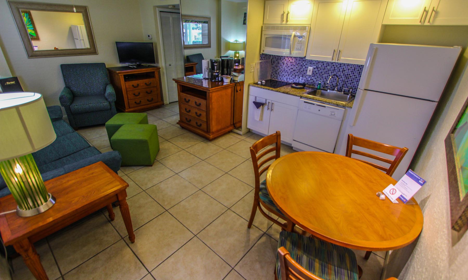 A cozy dining table and kitchenette at VRI's Mariner Beach Club in St. Pete Beach, Florida.